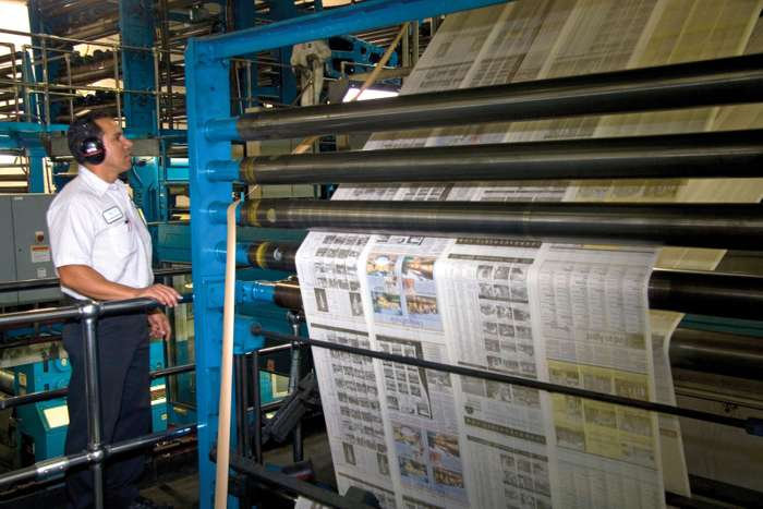 Newspaper web press printing.