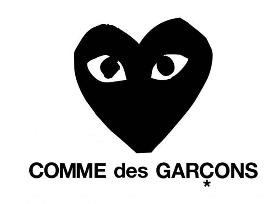 Comme des Garcons logo in black and white. 
